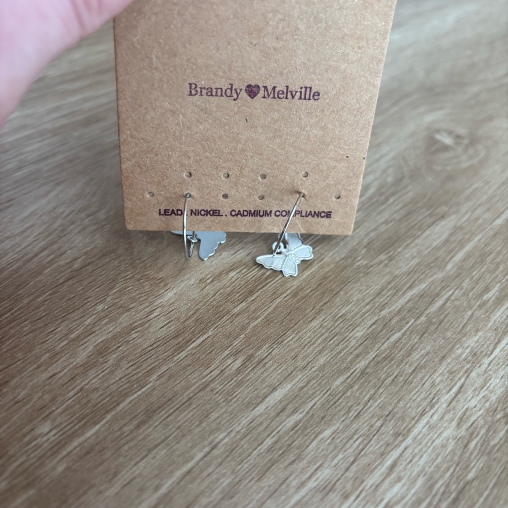 Brandy Melville Silver Butterfly Charm Earrings - Picture 3 of 3